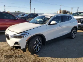 2020 BMW X2 xDrive28i with VIN WBXYJ1C02L5P85780, listed as a Copart auction lot 81761284 with 14,451 mi miles and Salvage Title. Bid and sale history available at carsss.com. Image 1.