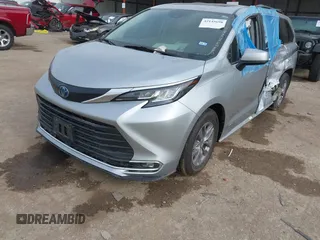 2021 Toyota Sienna XLE with VIN 5TDYRKEC9MS041334, listed as a IAAI auction lot 42145698 with 117,229 mi miles and . Bid and sale history available at DreamBid. Image 2.
