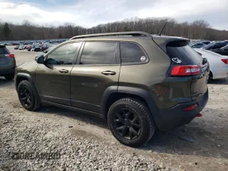 2015 Jeep Cherokee Trailhawk with VIN 1C4PJMBS5FW725729, listed as a Copart auction lot 49943495 with 139,796 mi miles and Clean Title. Bid and sale history available at carsss.com. Image 2.