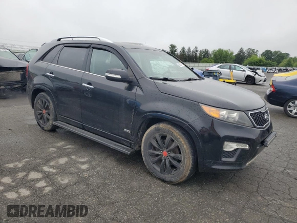 2012 Kia Sorento SX with VIN 5XYKWDA21CG213651, listed as a Copart auction lot 60831745 with 227,817 mi miles and Clean title. Bid and sale history available at DreamBid. Image 4.