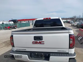 2017 GMC Sierra 1500 Denali with VIN 3GTU2PEC2HG438632, listed as a IAAI auction lot 41838632 with 80,319 mi miles and . Bid and sale history available at DreamBid. Image 16.