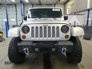 2010 Jeep Wrangler Sahara z VIN 1J4GA5D17AL109979, wystawiony jako Copart lot #45081225 z przebiegiem 190 826 mil mil oraz Szkoda całkowita • Salvage title. Historia ofert i sprzedaży dostępna na DreamBid. Obrazek 5.
