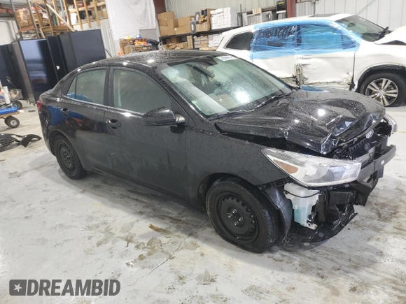 2023 Kia Rio LX with VIN 3KPA24AD0PE615673, listed as a Copart auction lot 70046634 with 55,906 mi miles and Salvage Title. Bid and sale history available at DreamBid. Image 4.
