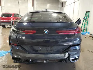 2024 BMW X6 xDrive40i with VIN 5UX33EX01R9T16988, listed as a Copart auction lot 48806495 with 0 mi miles and Salvage Title. Bid and sale history available at carsss.com. Image 6.