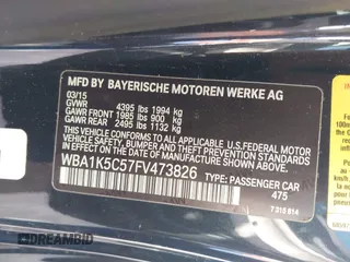 2015 BMW 2 Series 228i with VIN WBA1K5C57FV473826, listed as a IAAI auction lot 41866820 with 130,823 mi miles. Bid and sale history available at carsss.com. Image 9.