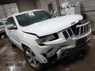2015 Jeep Grand Cherokee Overland with VIN 1C4RJFCG2FC741015, listed as a IAAI auction lot 41607606 with 132,038 mi miles and . Bid and sale history available at DreamBid. Image 1.
