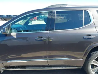 2017 GMC Acadia Denali with VIN 1GKKNPLS0HZ180284, listed as a IAAI auction lot 42220956 with 72,497 mi miles and . Bid and sale history available at DreamBid. Image 14.