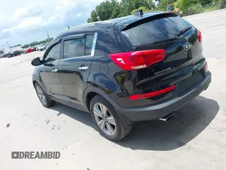 2014 Kia Sportage SX with VIN KNDPC3A66E7585269, listed as a IAAI auction lot 42423325 with 173,517 mi miles and . Bid and sale history available at DreamBid. Image 3.