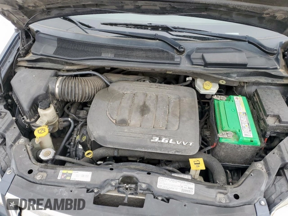 2013 Chrysler Town & Country Touring L with VIN 2C4RC1CG4DR734357, listed as a Copart auction lot 53528215 with 146,680 mi miles and Salvage Title. Bid and sale history available at DreamBid. Image 12.