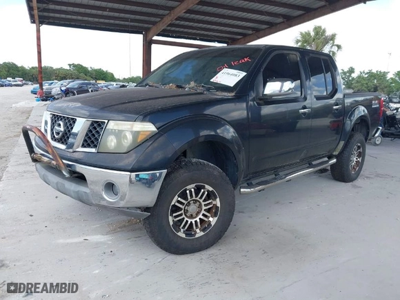 2005 Nissan Frontier 4WD SE with VIN 1N6AD07W55C458719, listed as a IAAI auction lot 41964083 with 189,814 mi miles. Bid and sale history available at carsss.com. Image 2.