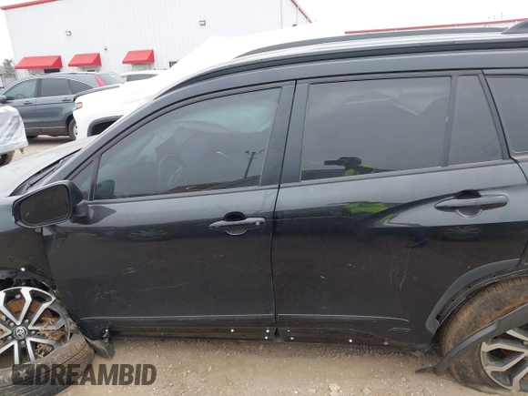 2023 Toyota Corolla Cross Hybrid S with VIN 7MUFBABG6PV010999, listed as a IAAI auction lot 41489541 with 14,707 mi miles and . Bid and sale history available at DreamBid. Image 15.