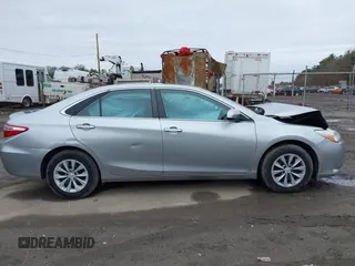 2015 Toyota Camry XLE with VIN 4T4BF1FK1FR468666, listed as a IAAI auction lot 42005934 with 124,173 mi miles and . Bid and sale history available at DreamBid. Image 13.