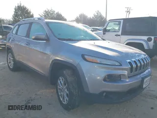 2014 Jeep Cherokee Latitude z VIN 1C4PJMCB0EW282001, wystawiony jako IAAI lot #41639890 z przebiegiem 104 312 mil mil oraz . Historia ofert i sprzedaży dostępna na DreamBid. Obrazek 1.
