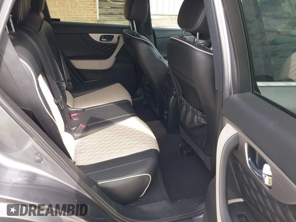 2017 Infiniti QX70 z VIN JN8CS1MW9HM412647, wystawiony jako IAAI lot #41830232 z przebiegiem 114 954 mil mil oraz . Historia ofert i sprzedaży dostępna na DreamBid. Obrazek 8.