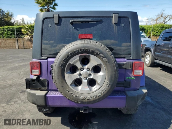 2017 Jeep Wrangler Unlimited Sahara with VIN 1C4BJWEG8HL657654, listed as a Copart auction lot 51763015 with 87,949 mi miles and Salvage Title. Bid and sale history available at carsss.com. Image 6.