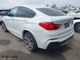 2017 BMW X4 M40i with VIN 5UXXW7C59H0M91384, listed as a IAAI auction lot 41883585 with 163,547 mi miles. Bid and sale history available at carsss.com. Image 3.