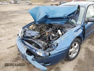 2004 Ford Taurus SE with VIN 1FAFP53U74A140294, listed as a IAAI auction lot 41630953 with Not Provided miles and . Bid and sale history available at DreamBid. Image 6.