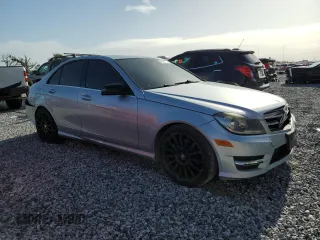 2014 Mercedes-Benz C 250 Sport with VIN WDDGF4HB8EA955064, listed as a Copart auction lot 63184135 with 104,735 mi miles and Salvage title. Bid and sale history available at DreamBid. Image 4.