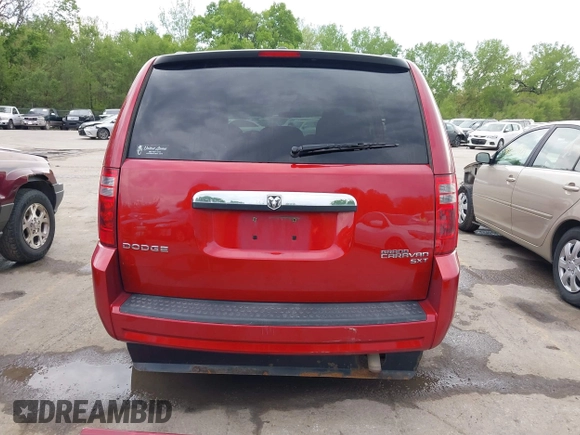 2010 Dodge Grand Caravan SXT z VIN 2D4RN5D19AR258407, wystawiony jako IAAI lot #42072185 z przebiegiem 205 424 mil mil oraz . Historia ofert i sprzedaży dostępna na DreamBid. Obrazek 17.