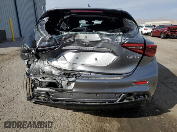 2019 Infiniti QX30 Essential with VIN SJKCH5CP5KA010822, listed as a Copart auction lot 75909634 with 33,563 mi miles and Salvage title. Bid and sale history available at DreamBid. Image 6.