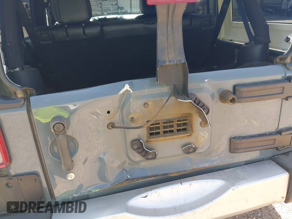 2014 Jeep Wrangler Unlimited Sahara with VIN 1C4BJWEG5EL326980, listed as a IAAI auction lot 42031659 with 116,181 mi miles and . Bid and sale history available at DreamBid. Image 6.