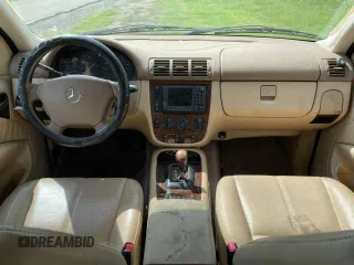 2000 Mercedes-Benz M-Class with VIN 4JGAB72E8YA154277, listed as a Copart auction lot 85389754 with 0 mi miles and Clean Title. Bid and sale history available at carsss.com. Image 9.