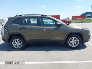 2015 Jeep Cherokee Sport with VIN 1C4PJMAB9FW595102, listed as a IAAI auction lot 42257918 with 95,059 mi miles and . Bid and sale history available at DreamBid. Image 13.