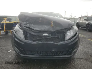 2013 Kia Optima LX z VIN 5XXGM4A72DG175781, wystawiony jako Copart lot #58235885 z przebiegiem 180 949 mil mil oraz Szkody całkowita. Historia ofert i sprzedaży dostępna na DreamBid. Obrazek 5.