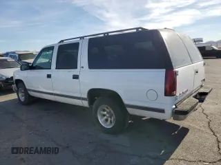 1999 GMC Suburban with VIN 3GKEC16R6XG538009, listed as a Copart auction lot 87112424 with 220,487 mi miles and Clean Title. Bid and sale history available at DreamBid. Image 2.