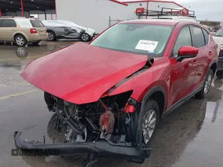 2023 Mazda CX-5 2.5 S Select Package with VIN JM3KFBBM4P0151475, listed as a IAAI auction lot 41462270 with 31,699 mi miles. Bid and sale history available at carsss.com. Image 2.