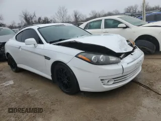2008 Hyundai Tiburon GS z VIN KMHHM66DX8U290154, wystawiony jako Copart lot #67054434 z przebiegiem 191 963 mil mil oraz Nie do naprawy • Non repairable. Historia ofert i sprzedaży dostępna na DreamBid. Obrazek 4.