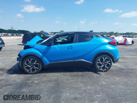 2019 Toyota C-HR XLE with VIN NMTKHMBX6KR097934, listed as a IAAI auction lot 39276687 with 56,973 mi miles. Bid and sale history available at carsss.com. Image 13.