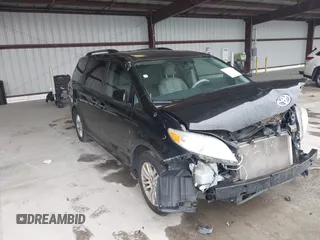 2014 Toyota Sienna XLE with VIN 5TDYK3DC0ES493864, listed as a IAAI auction lot 42313298 with 129,062 mi miles and . Bid and sale history available at DreamBid. Image 1.