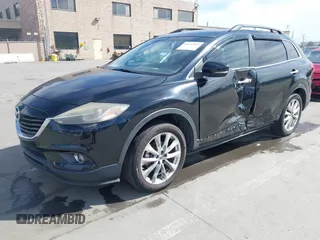 2015 Mazda CX-9 Grand Touring z VIN JM3TB2DA4F0450014, wystawiony jako IAAI lot #41692935 z przebiegiem 90 800 mil mil oraz . Historia ofert i sprzedaży dostępna na DreamBid. Obrazek 17.