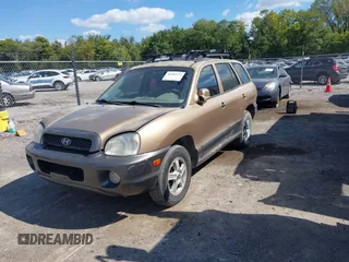 2004 Hyundai Santa Fe GLS z VIN KM8SC73EX4U814067, wystawiony jako IAAI lot #40404373 z przebiegiem 182 101 mil mil oraz . Historia ofert i sprzedaży dostępna na DreamBid. Obrazek 2.