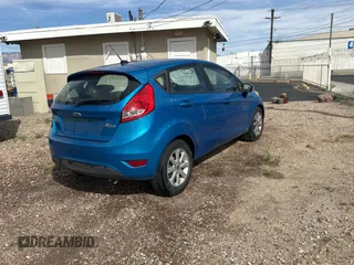 2013 Ford Fiesta SE with VIN 3FADP4EJ0DM141097, listed as a Copart auction lot 51342175 with 146,316 mi miles and Clean Title. Bid and sale history available at carsss.com. Image 4.