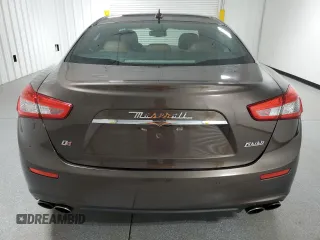 2016 Maserati Ghibli S Q4 z VIN ZAM57RTA4G1168220, wystawiony jako Copart lot #57850955 z przebiegiem 126 378 mil mil oraz Tytuł czysty. Historia ofert i sprzedaży dostępna na DreamBid. Obrazek 6.