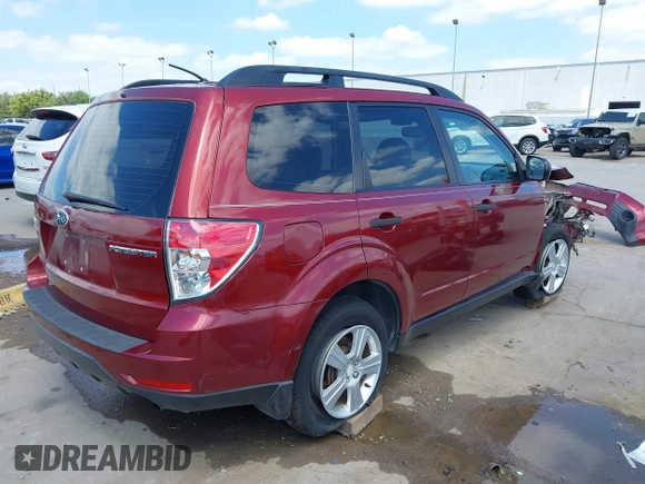 2012 Subaru Forester X with VIN JF2SHBBC5CH430957, listed as a IAAI auction lot 42020033 with 90,216 mi miles and . Bid and sale history available at DreamBid. Image 4.