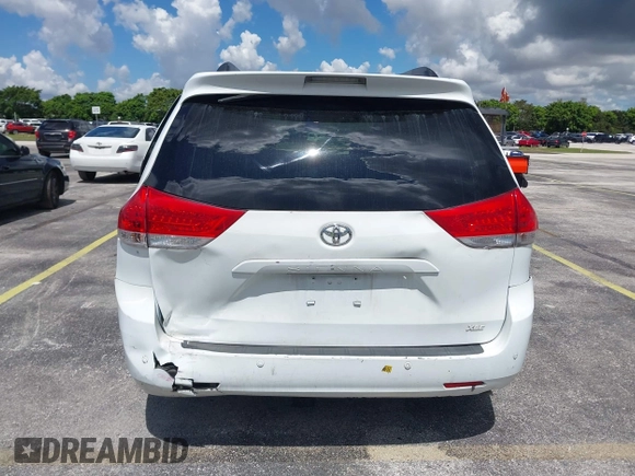 2014 Toyota Sienna XLE with VIN 5TDYK3DC4ES414728, listed as a IAAI auction lot 42588916 with 291,007 mi miles and . Bid and sale history available at DreamBid. Image 16.