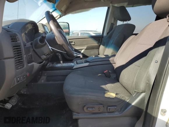 2015 Nissan Titan SV with VIN 1N6AA0EC1FN507132, listed as a Copart auction lot 74401954 with 169,236 mi miles and Salvage title. Bid and sale history available at DreamBid. Image 7.