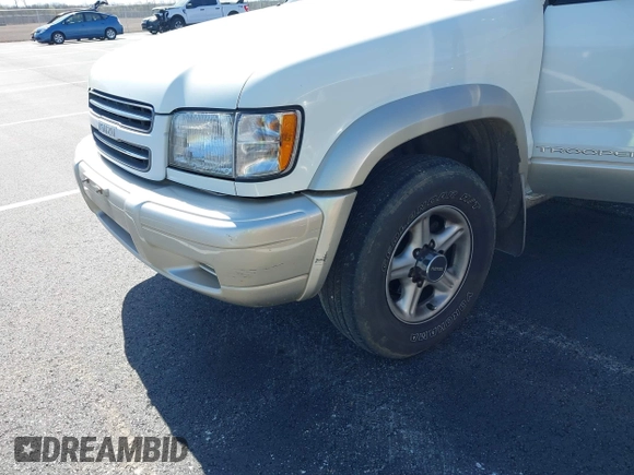 2002 Isuzu Trooper S with VIN JACDJ58X327JOO132, listed as a IAAI auction lot 41830954 with 192,828 mi miles and . Bid and sale history available at DreamBid. Image 6.