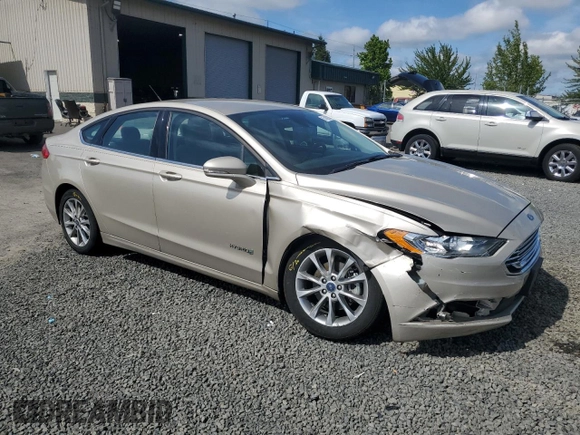 2017 Ford Fusion Hybrid SE with VIN 3FA6P0LU8HR319135, listed as a Copart auction lot 57462035 with 75,288 mi miles and Salvage title. Bid and sale history available at DreamBid. Image 4.