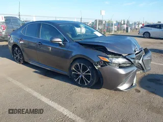 2019 Toyota Camry LE z VIN 4T1B11HK1KU840586, wystawiony jako IAAI lot #42141357 z przebiegiem 109 159 mil mil oraz . Historia ofert i sprzedaży dostępna na DreamBid. Obrazek 1.