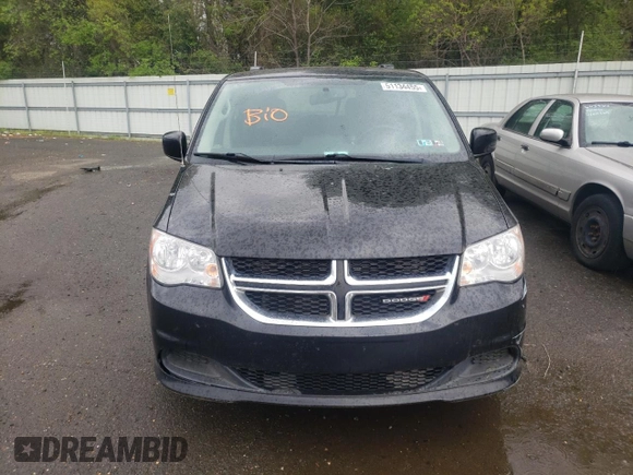 2015 Dodge Grand Caravan SXT with VIN 2C4RDGCG2FR648841, listed as a Copart auction lot 51134455 with 121,570 mi miles and Salvage Title. Bid and sale history available at DreamBid. Image 5.