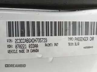 2013 Chrysler 300 with VIN 2C3CCABGXDH735739, listed as a IAAI auction lot 41282492 with 121,487 mi miles. Bid and sale history available at carsss.com. Image 9.