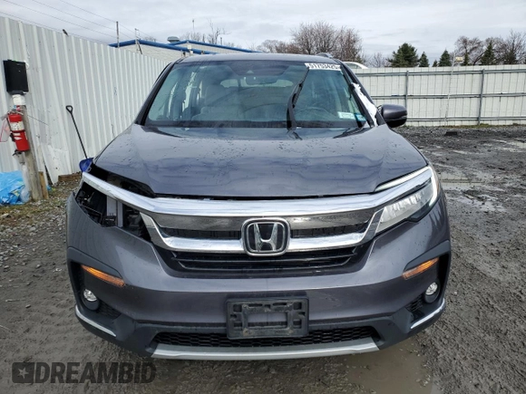 2020 Honda Pilot Touring 7-Passenger with VIN 5FNYF6H60LB039609, listed as a Copart auction lot 51753425 with 57,512 mi miles and Salvage title. Bid and sale history available at DreamBid. Image 5.