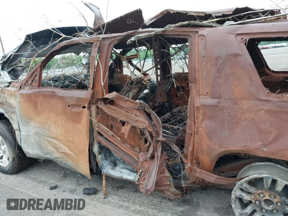 2017 Chevrolet Suburban LT with VIN 1GNSKHKC5HR235341, listed as a IAAI auction lot 42219754 with Not Provided miles and . Bid and sale history available at DreamBid. Image 13.