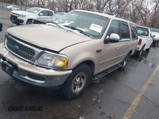 1997 Ford Expedition XLT z VIN 1FMEU17L2VLB53786, wystawiony jako IAAI lot #41912417 z przebiegiem 198 435 mil mil oraz . Historia ofert i sprzedaży dostępna na DreamBid. Obrazek 2.