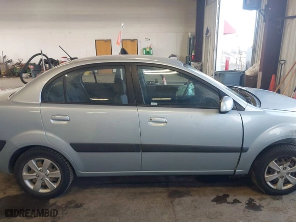 2009 Kia Rio with VIN KNADE223X96512538, listed as a IAAI auction lot 41765393 with NaN miles. Bid and sale history available at carsss.com. Image 13.