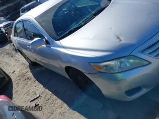 2010 Toyota Camry with VIN 4T1BF3EK1AU539266, listed as a IAAI auction lot 41208835 with 142,784 mi miles and . Bid and sale history available at DreamBid. Image 1.